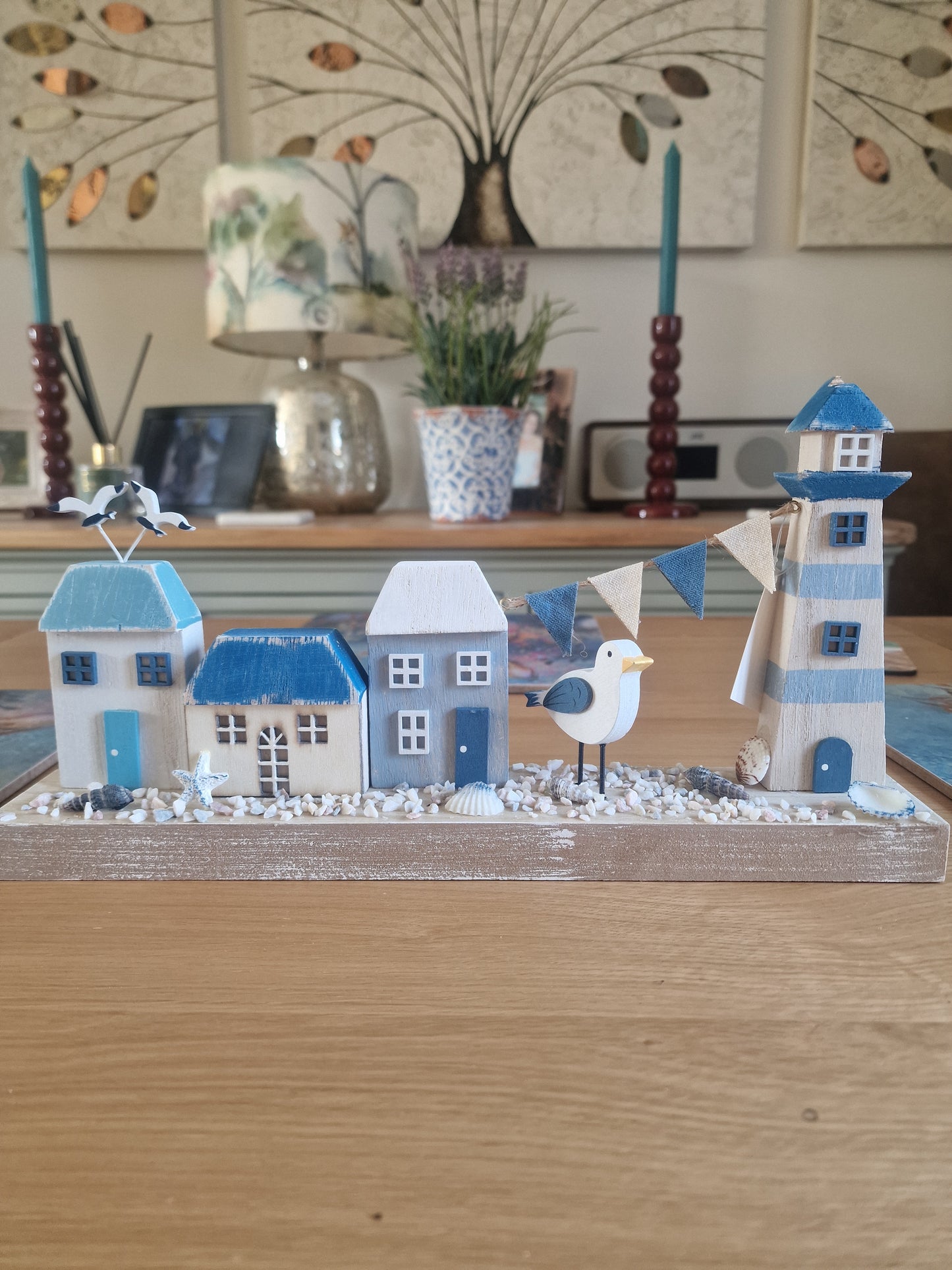 Harbourside Scene with Lighthouse and Cottages