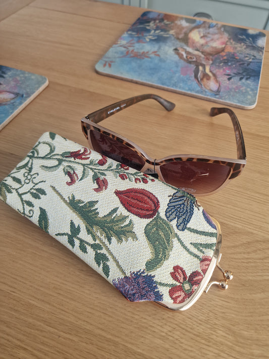 Morning Garden Design - Glasses purse in cream woven fabric with colourful floral and leafy botanical pattern plus metal clasp shown with brown tinted glasses