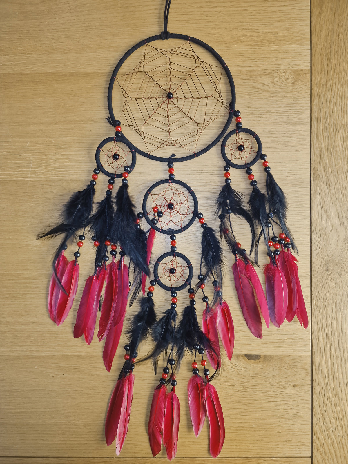 Spider Web Dreamcatcher | Gothic Halloween Wall Décor with black hoops, red feathers and beaded detailing