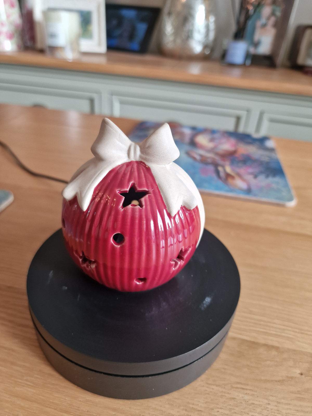 Red Ceramic Led Bauble With Bow 10cm red ribbed ceramic LED ornament with white bow detail