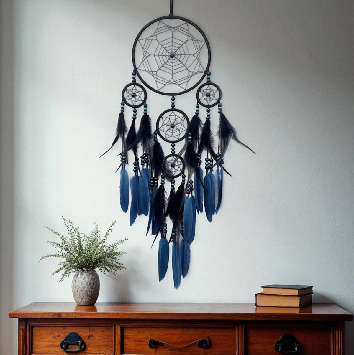 Spider Web Dreamcatcher | Gothic Halloween Wall Décor featuring geometric black and navy web hoops, beads and layered feathers as a dramatic wall hanging