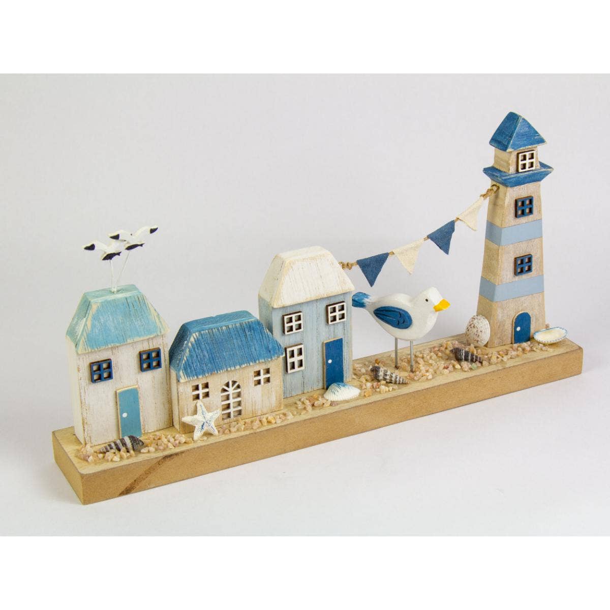Harbourside Scene with Lighthouse and Cottages